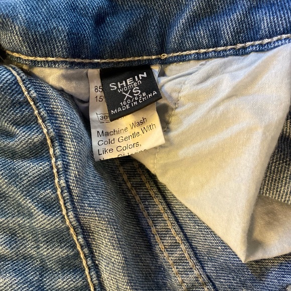 This is a product from SHEIN. Color is light washed. has not been worn. - Picture 4 of 4